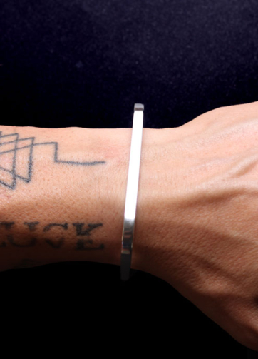 male jewellery rigid bracelet of sterling silver with model