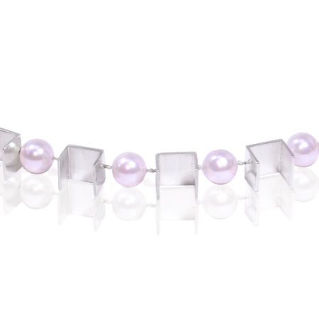 Deatil of silver and cultured pearls